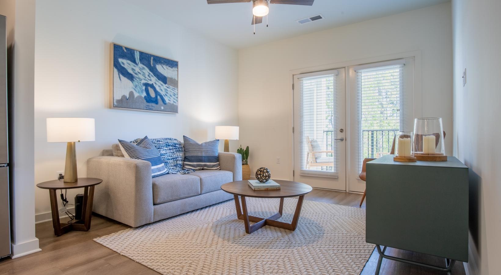 Relax and unwind in stylish living spaces a living room with a couch and a table