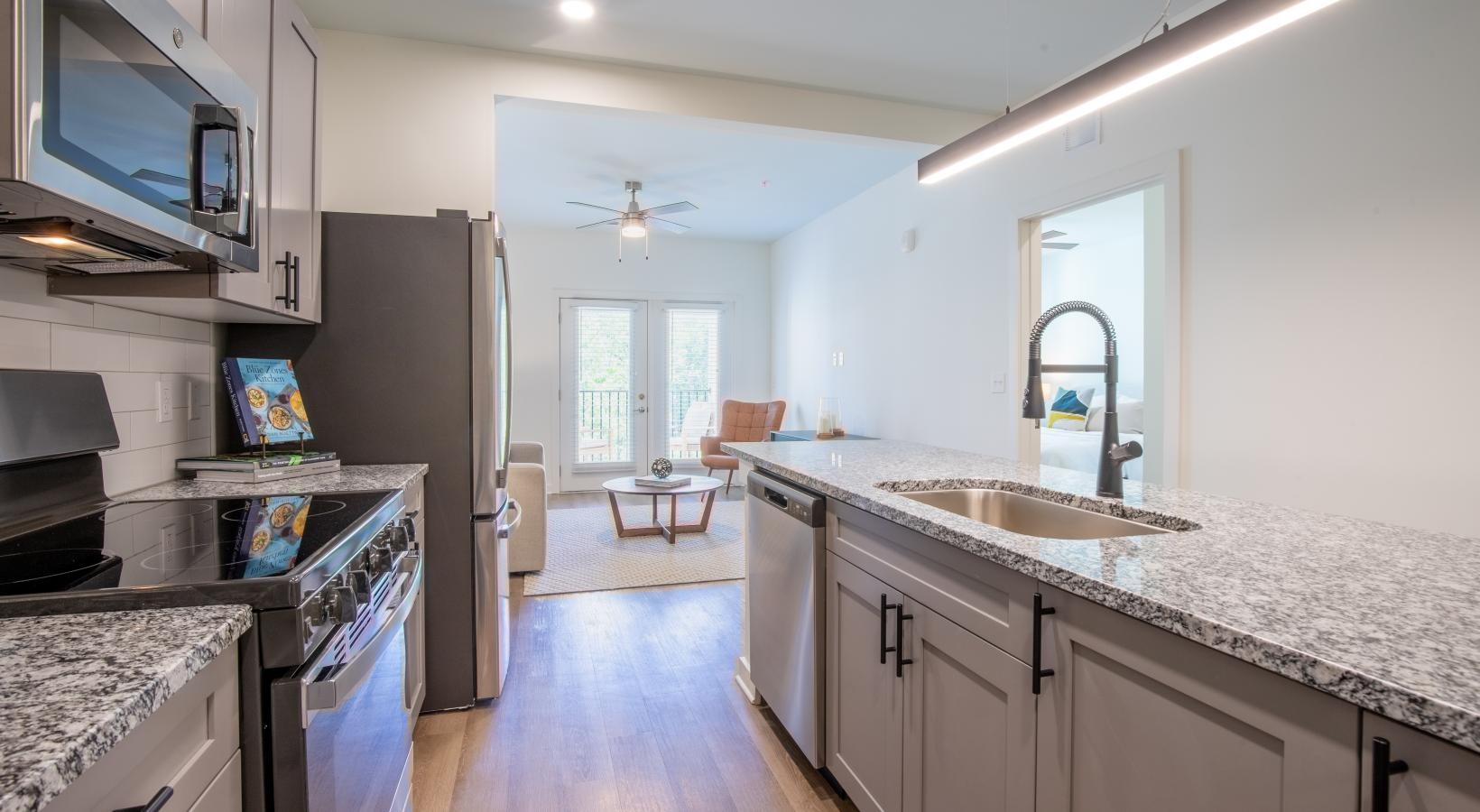 Beautiful kitchens with designer finishes a kitchen with a wood floor