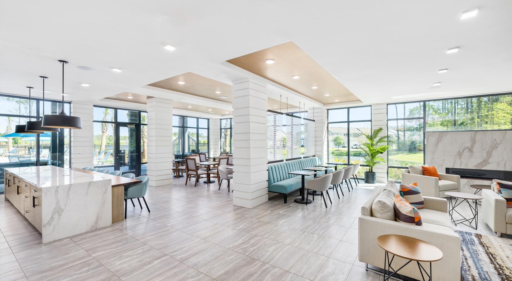 Enjoy our resident-only features a large room with a pool and chairs