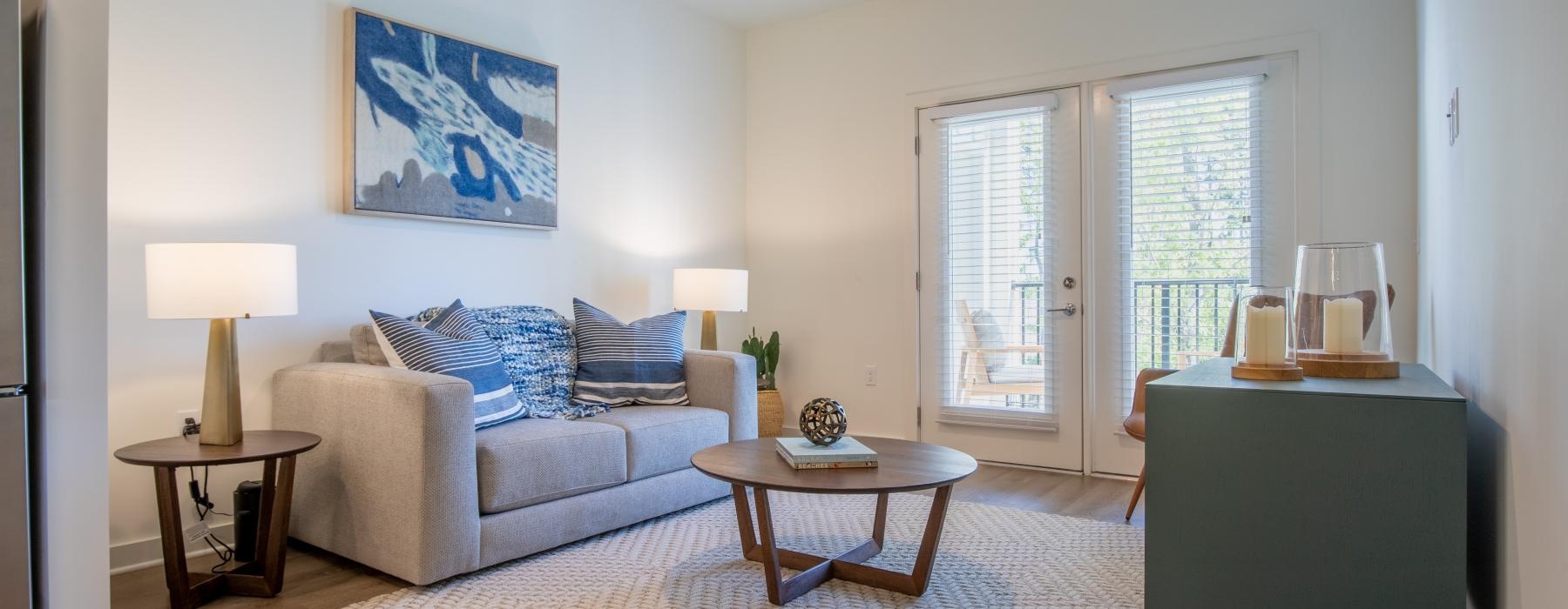 a living room with a couch and a table