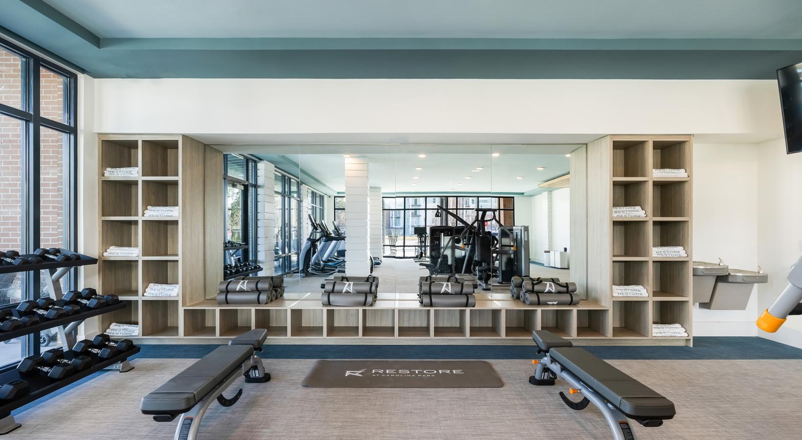 Quick access to state-of-the-art amenities a gym with exercise equipment
